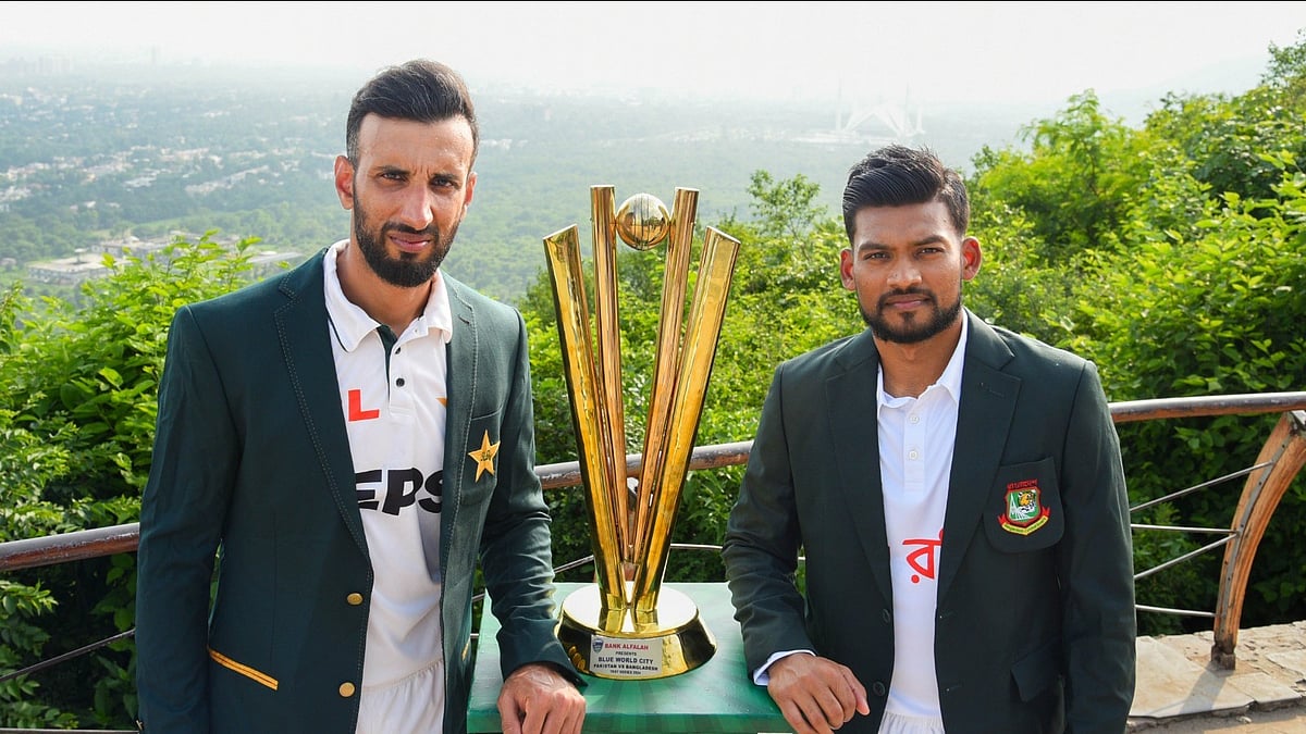 Photo: X | Pakistan Cricket : Pakistan Test captain Shan Masood (L) and Bangladesh skipper Najmul Hossain Shanto with the trophy.